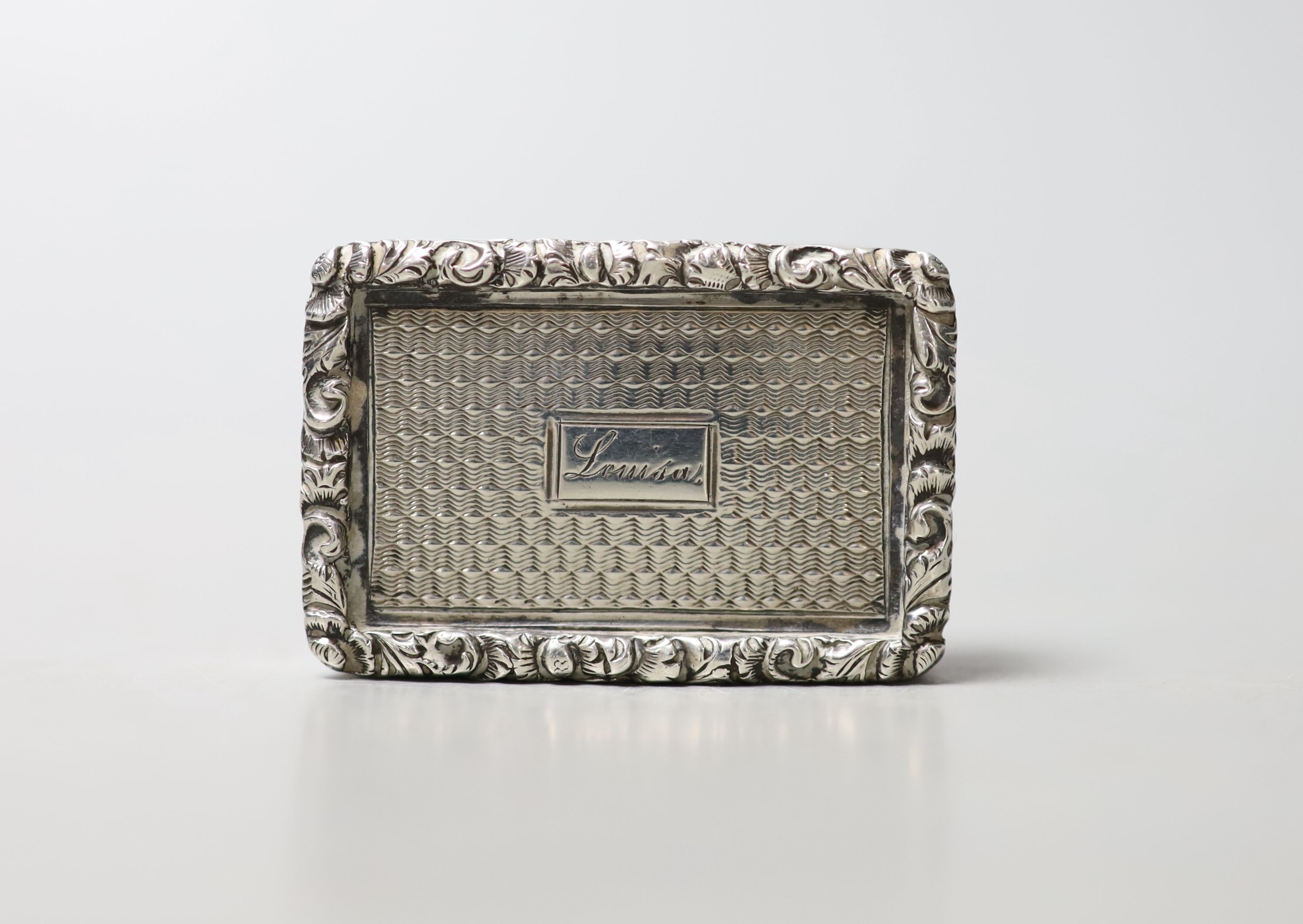 A George IV silver rectangular vinaigrette by Nathaniel Mills, Birmingham, 1827, engraved 'Louisa', 35mm.